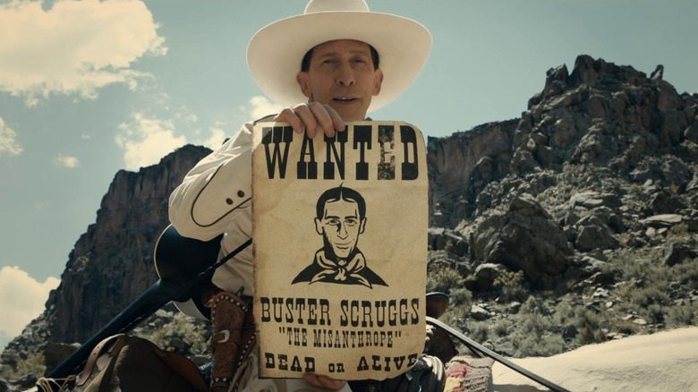 Tim Blake Nelson holding up his wanted poster in The Ballad of Buster Scruggs (2018)