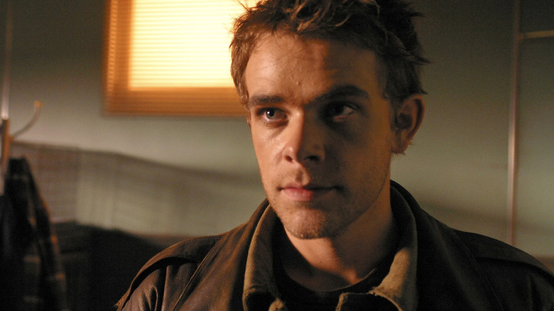 John Connor wearing brown jacket