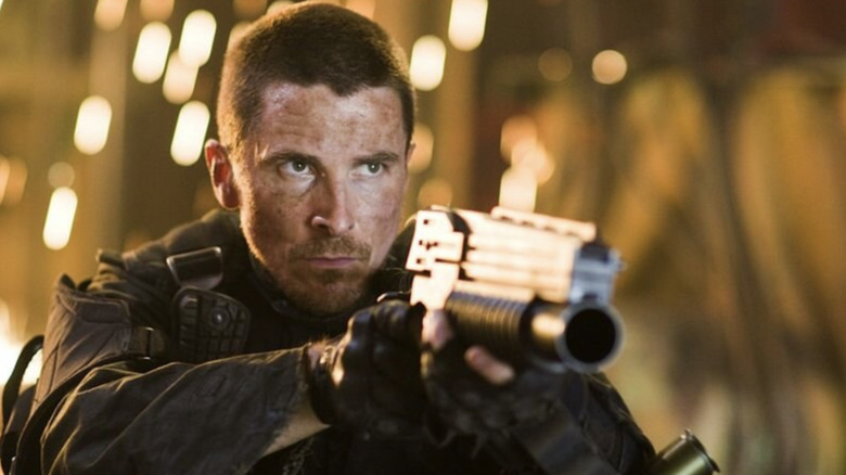 John Connor holding futuristic gun