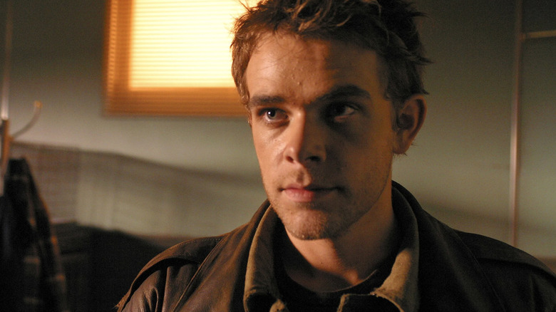 John Connor wearing brown jacket