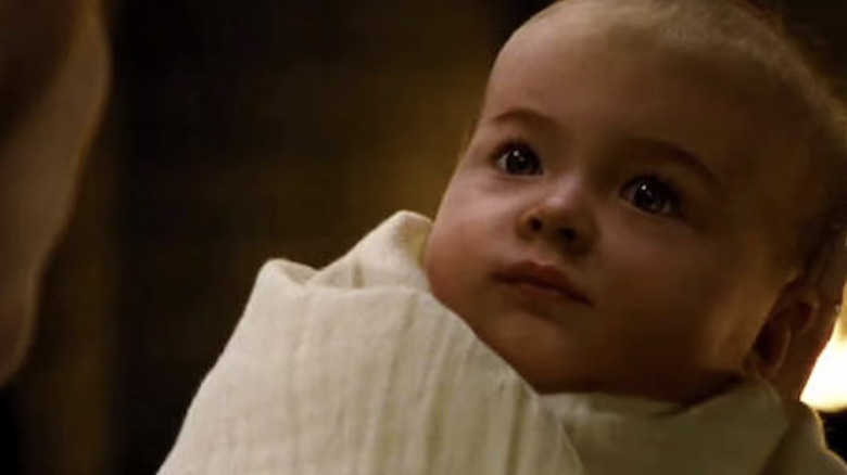 Bella cradles Renesmee in "The Twilight Saga: Breaking Dawn -- Part 2" (2012)