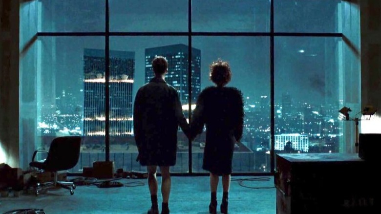 The Narrator and Marla watch explosions out the window