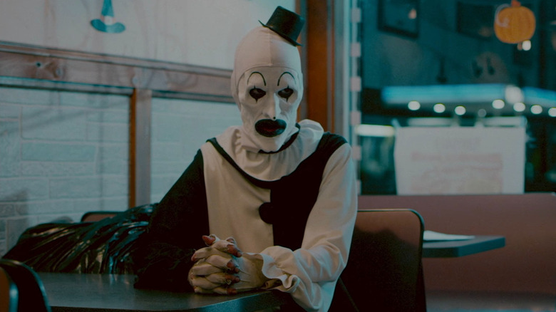 Art the Clown staring at Tara Heyes in Terrifier