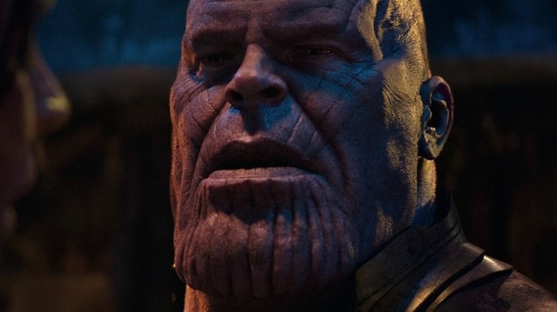 Thanos looks with an open mouth 