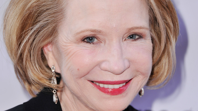 Debra Jo Rupp smiling for the camera