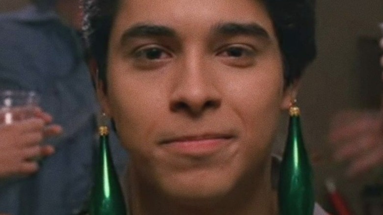 Fez smirking