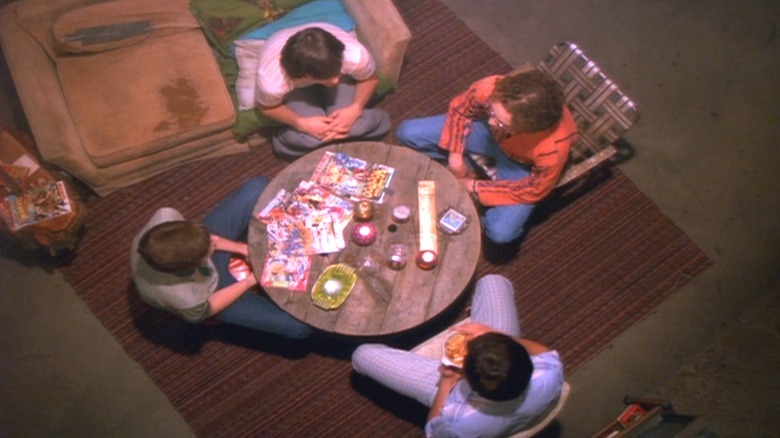 Kelso, Hyde, Fez, and Eric in circle
