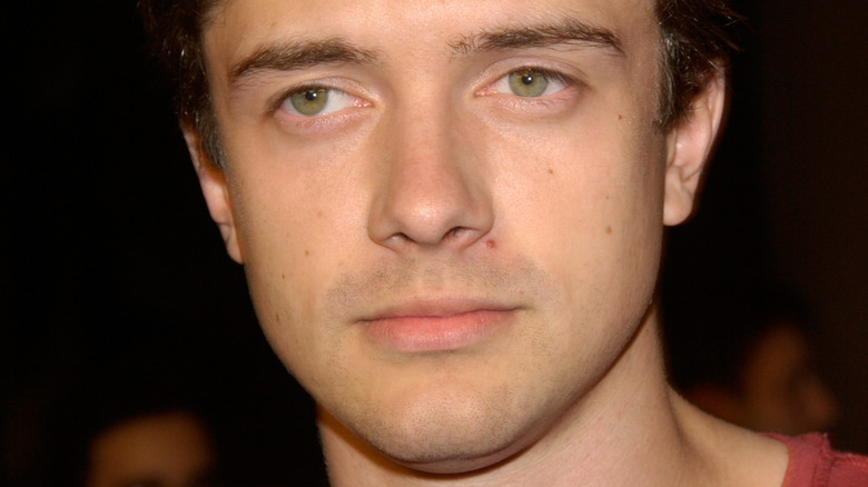 Topher Grace looks stoned