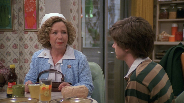 Kitty Forman talking to her son