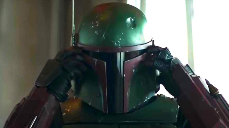 Boba Fett taking off his helmet