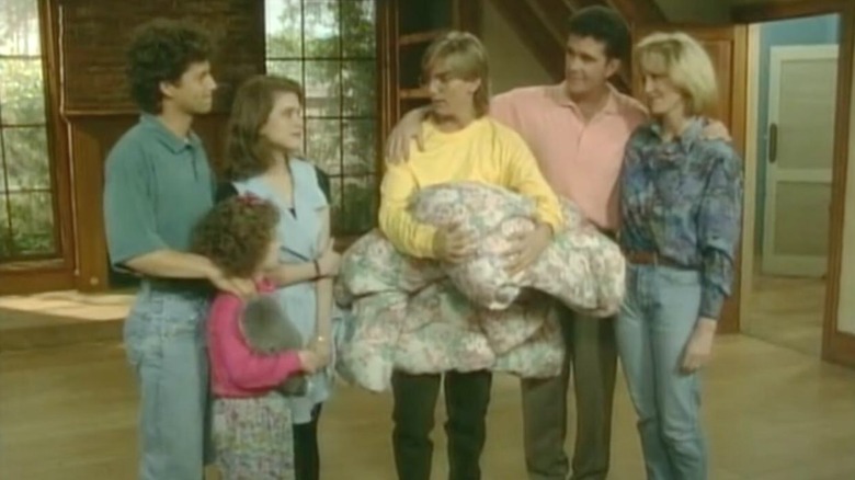 The Seaver family gathered together in "Growing Pains"