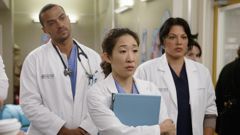 Jackson Avery, Cristina Yang, and Callie Torres standing together on Grey's Anatomy (2008)