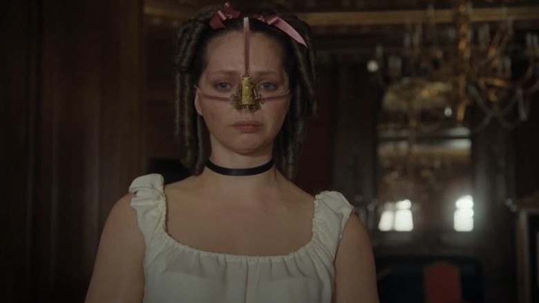Elvira (Lea Myren) wearing a nose brace in The Ugly Stepsister