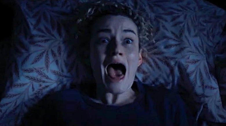 Justine screaming in bed in Weapons