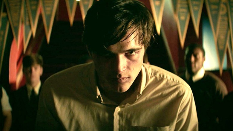 Jake Matthews looks menacingly at the camera in The Mortuary Collection (2019)