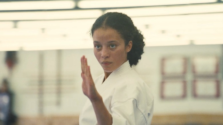 Willa practicing her martial art skills in "One Battle After Another" (2025)