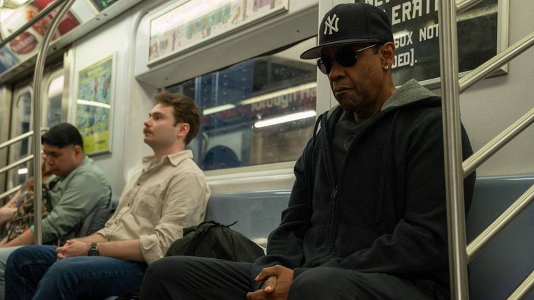 David King sits on the subway in "Highest 2 Lowest" (2025)