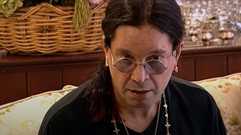 Ozzy Osbourne sitting on his sofa in The Osbournes Season 2