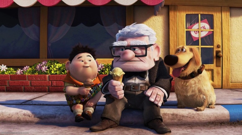 Russell, Carl, and Dug eating ice cream on the curb in Up