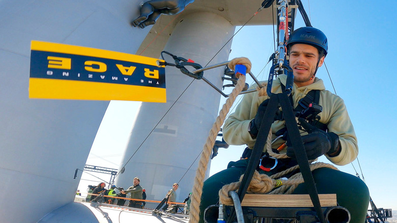 Tucker Des Lauriers on a zipline in "The Amazing Race" (2001-present)