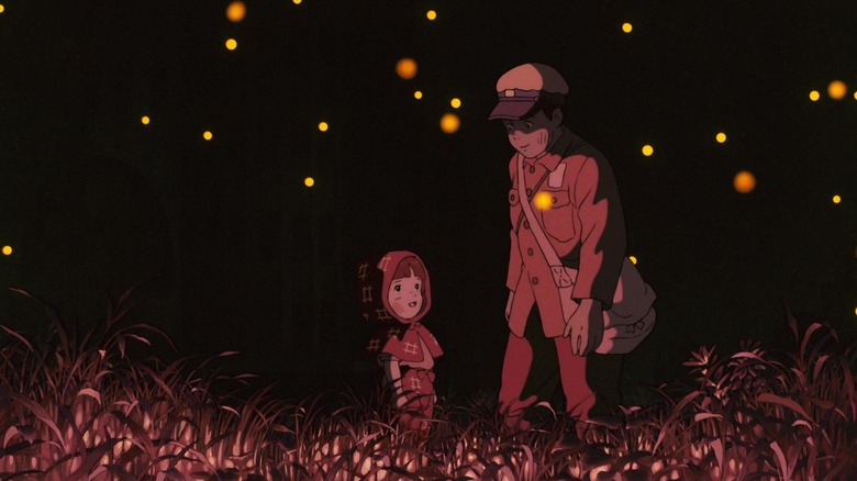 Fireflies surround the ghosts of Setsuko and Seita in "Grave of the Fireflies" (1988)