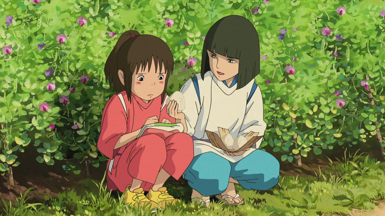 Haku offering Chihiro a rice ball in 
