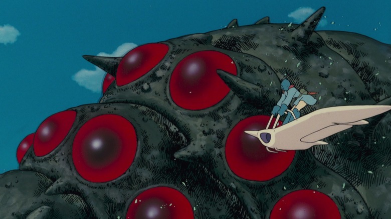 Nausicaä flies a glider next to an Ohm in "Nausicaä of the Valley of the Wind" (1984)
