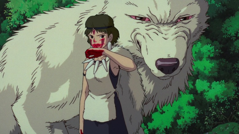 San wipes blood from her mouth in front of Moro in "Princess Mononoke" (1997)