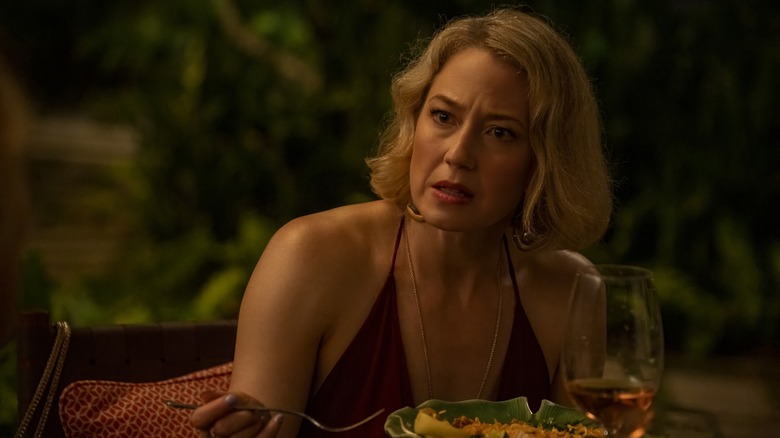 Laurie looking shocked at dinner on The White Lotus