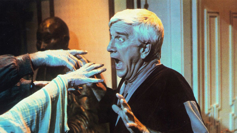 Richard Vickers being attacked by zombies