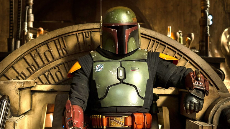 Boba Fett sitting on a throne in "The Book of Boba Fett."