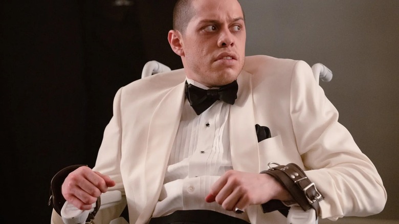 Max all chained up in The Home (2025)