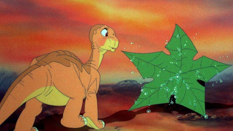 Littlefoot admires a giant, dewey leaf in "The Land Before Time" (1988)