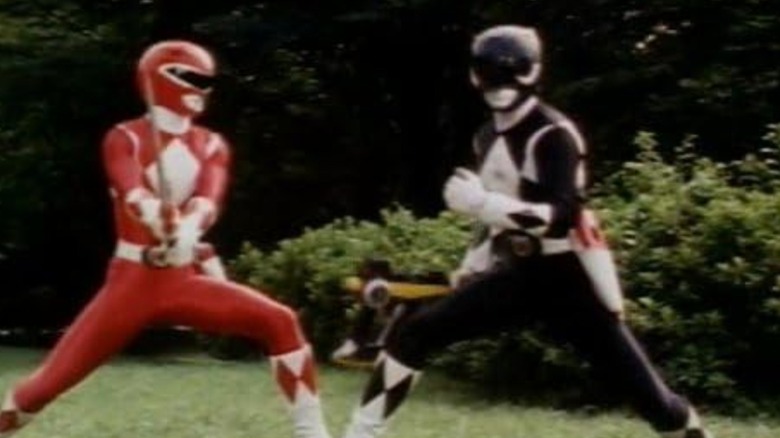 Black power ranger sparring with red power ranger in Mighty Morphin Power Rangers (1993 - 1995)