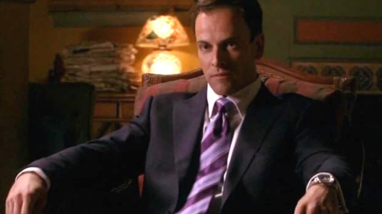 Jordan sitting in a chair in "Dexter."