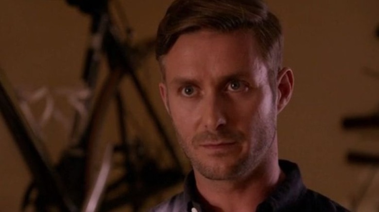 Oliver staring with wide eyes in Dexter.