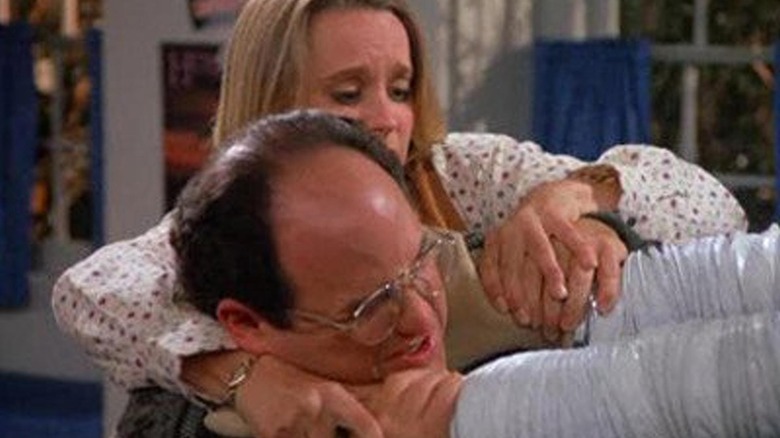 George plays a board game with the title character in "The Bubble Boy"