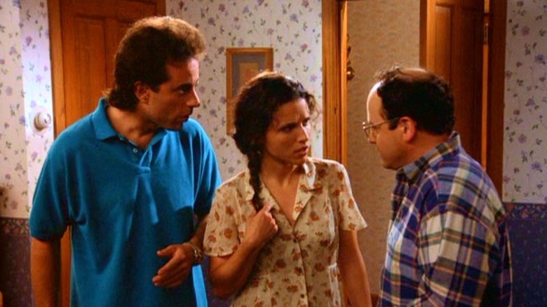 George confers with Jerry and Elaine in "The Hamptons"