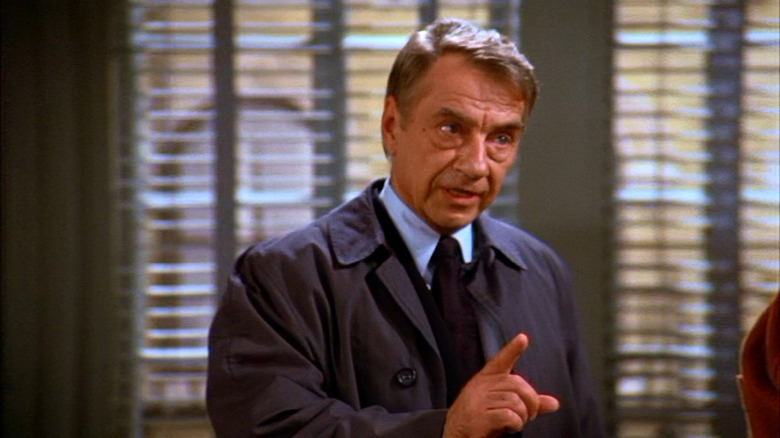 The library cop confronts Jerry in "The Library"