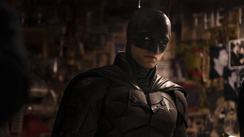 Batman looking around for clues in The Batman