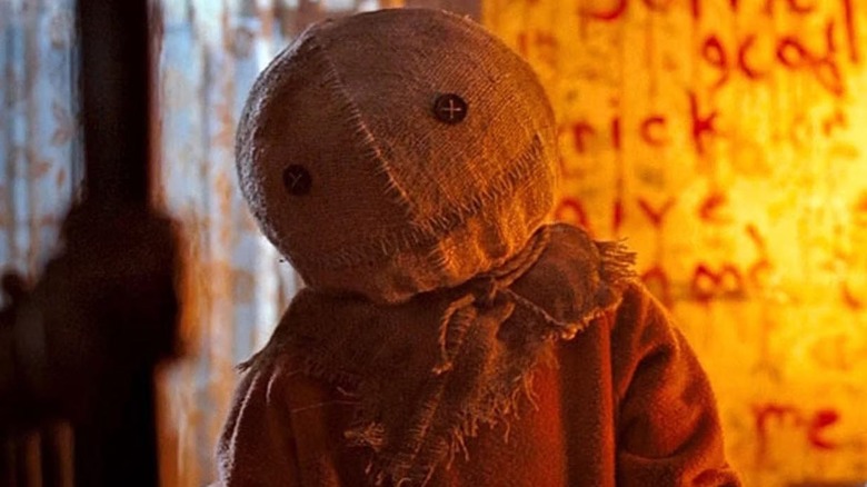 Sam standing in corner of room in Trick 'r Treat