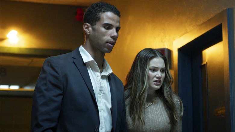 Jay and Ally looking down scared in "Heart Eyes" (2025)