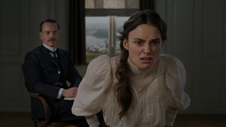 Michael Fassbender as Carl Jung and Keira Knightley as Sabina Spielrein in A Dangerous Method (2011)
