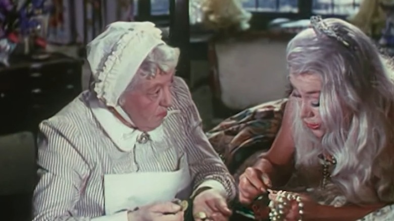 Nurse Carey and Miranda Trewella poring over jewelry in Mad About Men