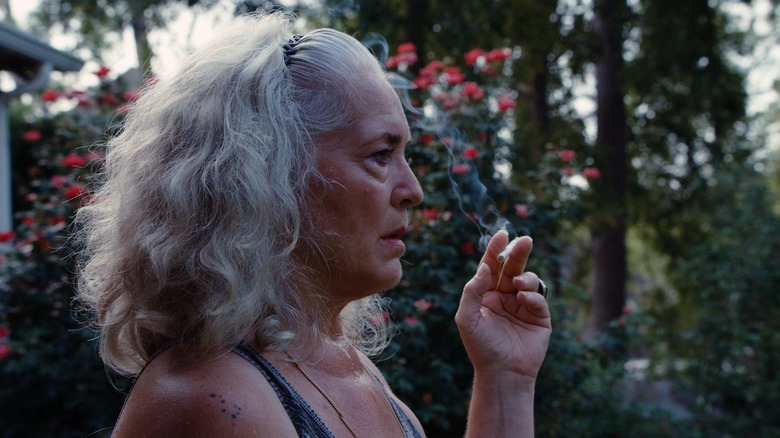 Krisha smokes a cigarette in 'Krisha' (2015)