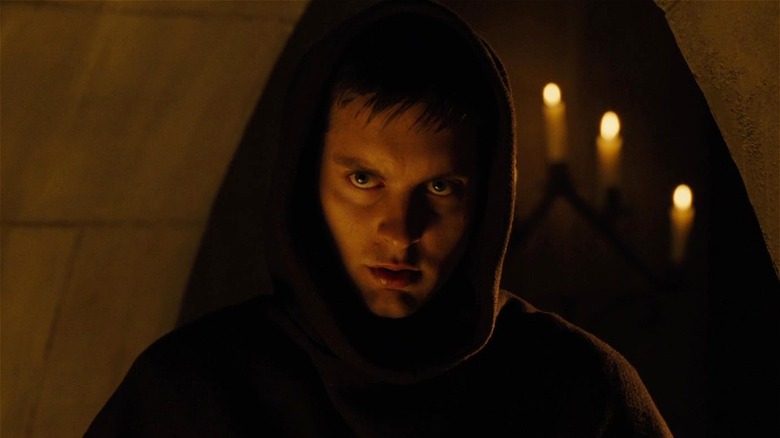 Tobey Maguire as a monk staring seductively