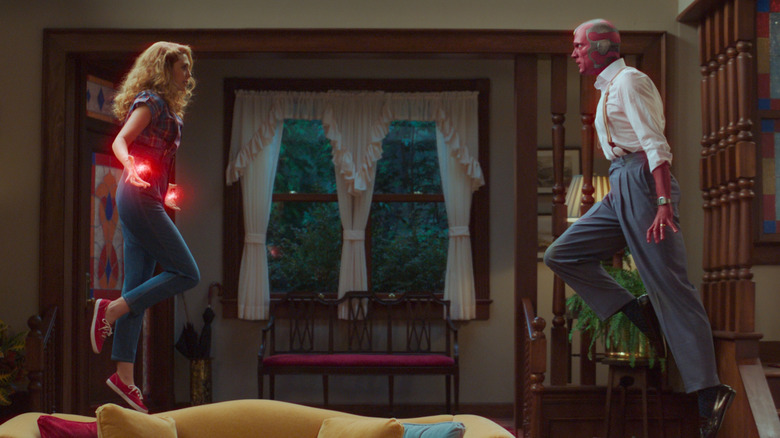 Wanda (Elizabeth Olsen) and Vision (Paul Bettany) preparing to battle each other in the 1980's version of Wanda's sitcom illusion