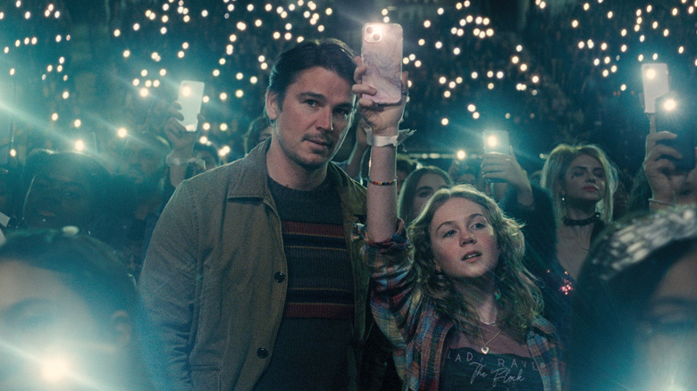Cooper and Riley attend the concert in "Trap" (2024)