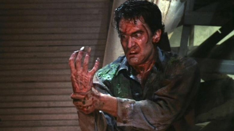 Ash's hand attacking him