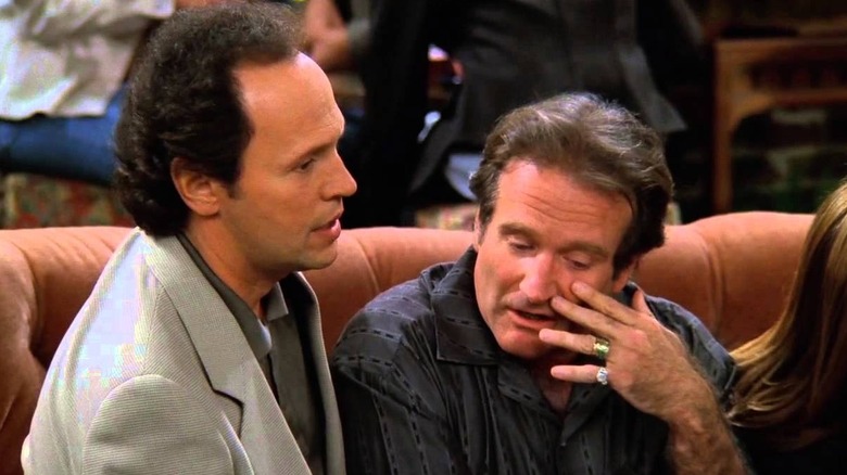 Billy Crystal and Robin Williams having a conversation in Central Perk on "Friends" (1994-2004)